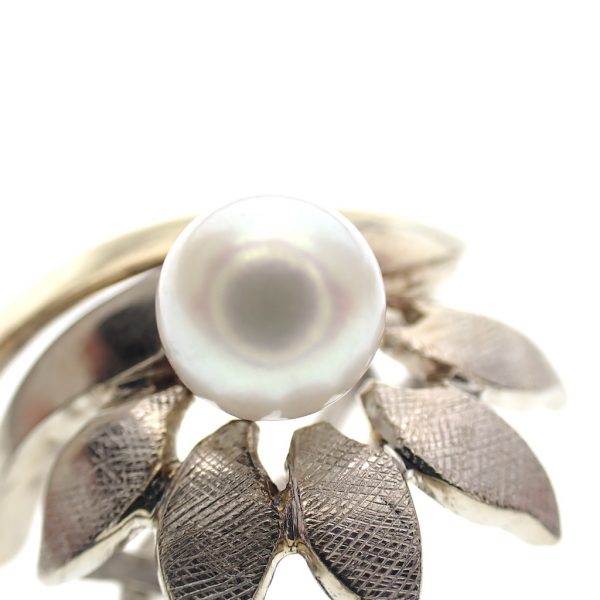 Bicolor gouden vintage oorclips met parel; Floraal design