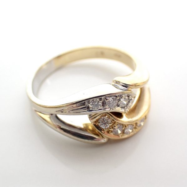 18 Krt. Bicolor gouden ring met diamanten 0,16 ct.