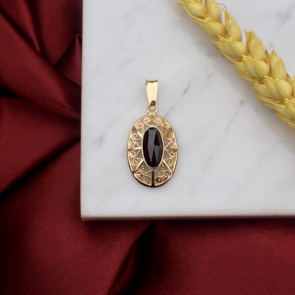 Vintage gouden hanger met ovale granaat