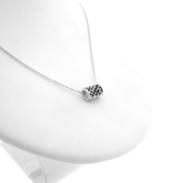 Zilveren hanger van een koker met zirconia