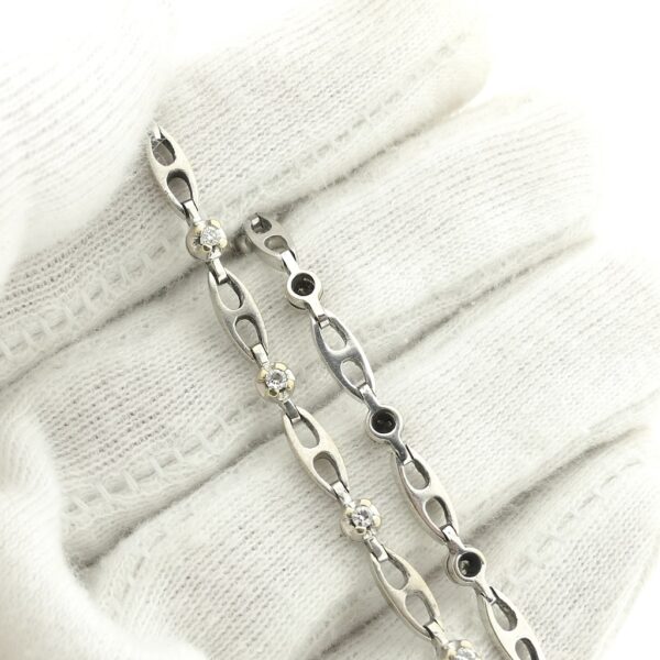 Witgouden fantasie armband met diamant; 0,24 ct. | 19 cm