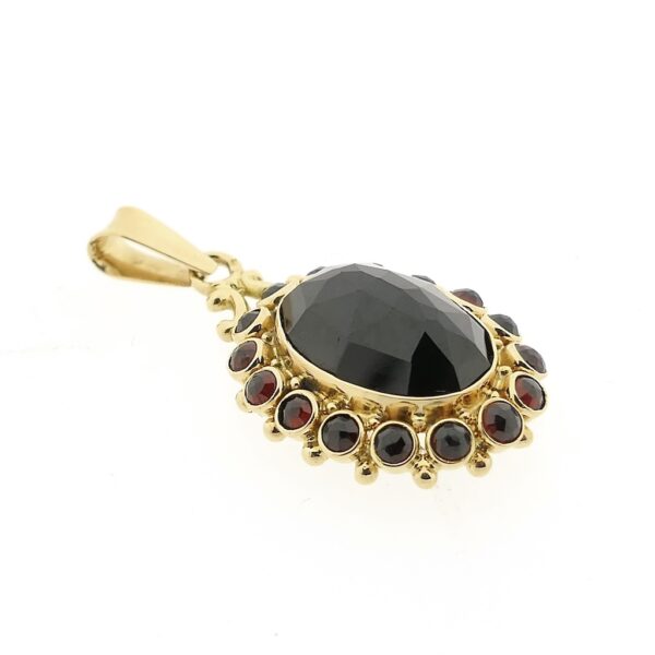 Vintage gouden entourage hanger met granaat