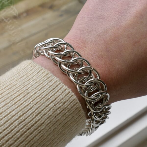 Robuuste zilveren schakel armband | 22 cm