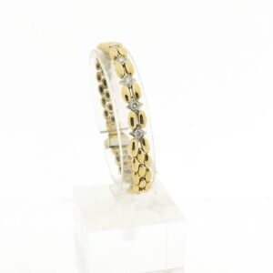 18 Krt. Gouden bismarck schakel armband met diamant; 0,4 ct. | 18,5 cm