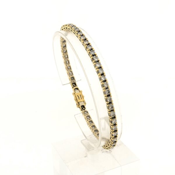 18 karaat geelgouden tennisarmband gezet met totaal 6,12 ct. diamanten