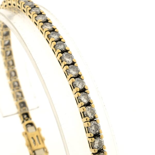 18 Krt. Gouden tennis armband met diamant; 6,12 ct. | 19 cm