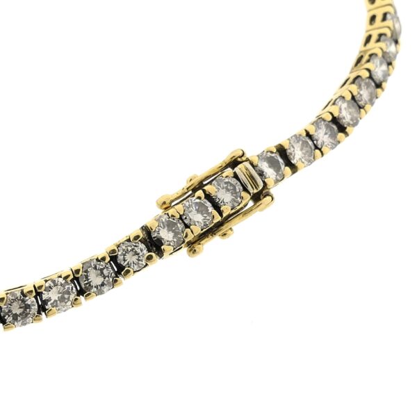 18 Krt. Gouden tennis armband met diamant; 6,12 ct. | 19 cm