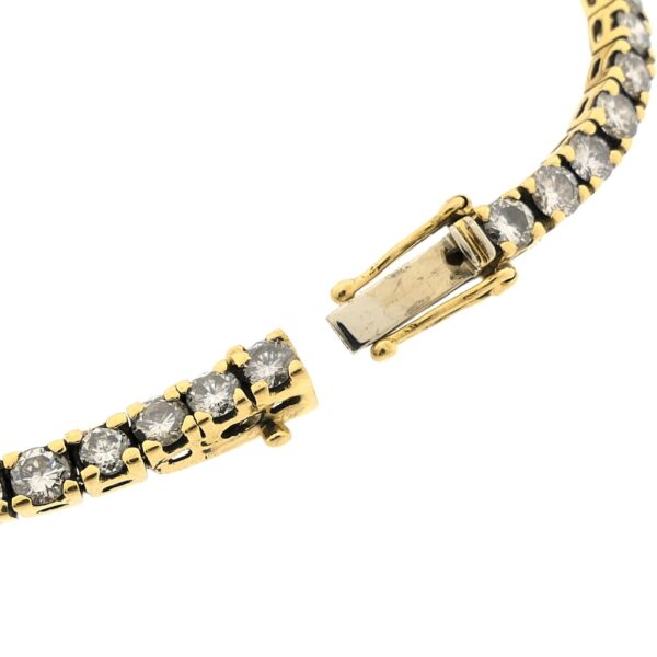 18 Krt. Gouden tennis armband met diamant; 6,12 ct. | 19 cm