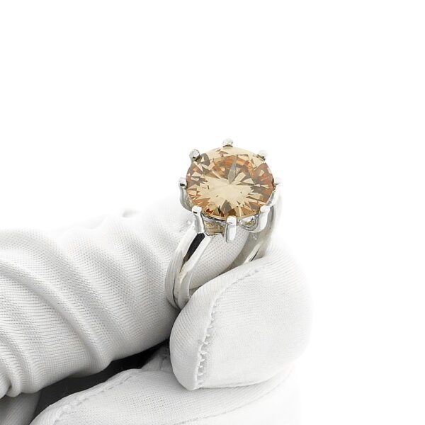 Zilveren robuuste ring met champagne zirconia steen