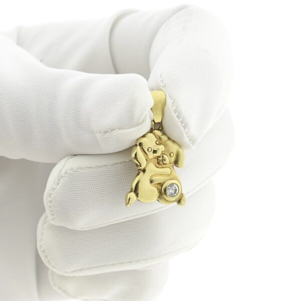 Gouden hanger van twee honden met zirconia