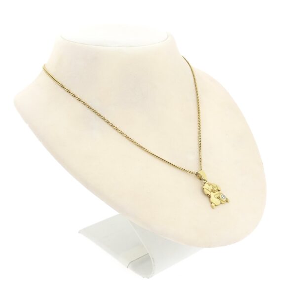 Gouden hanger van twee honden met zirconia