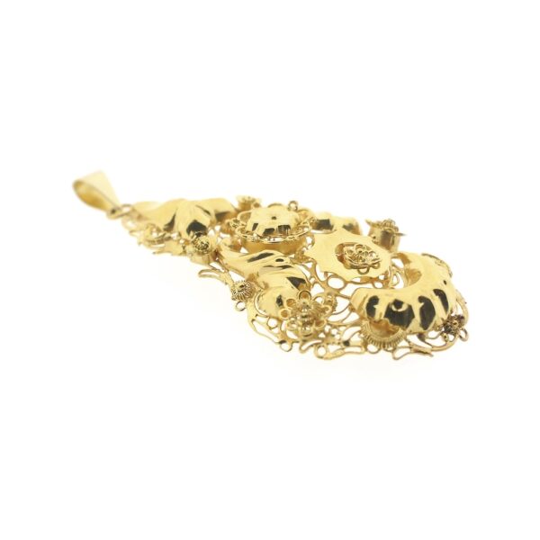 Antiek gouden hanger van een mutsenbel